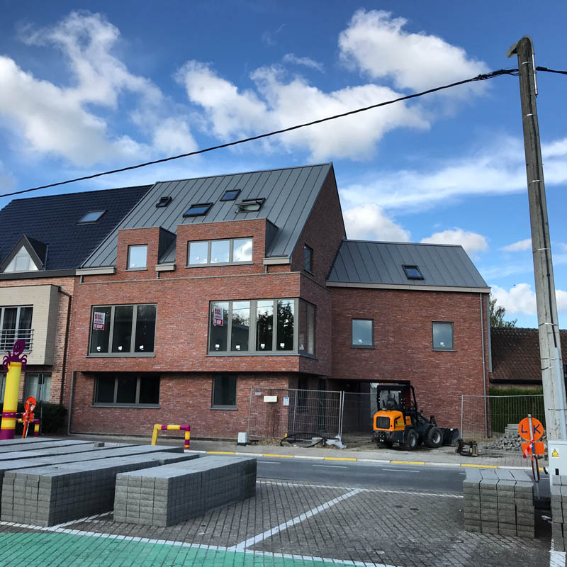 Zink staande naad dak in Merchtem